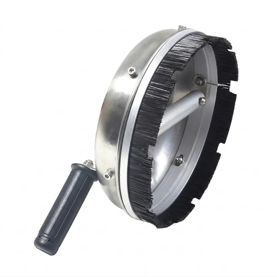 Tilted side view of a 12 inch rotary surface cleaner displaying the metal housing, bristle edge, and side handle.