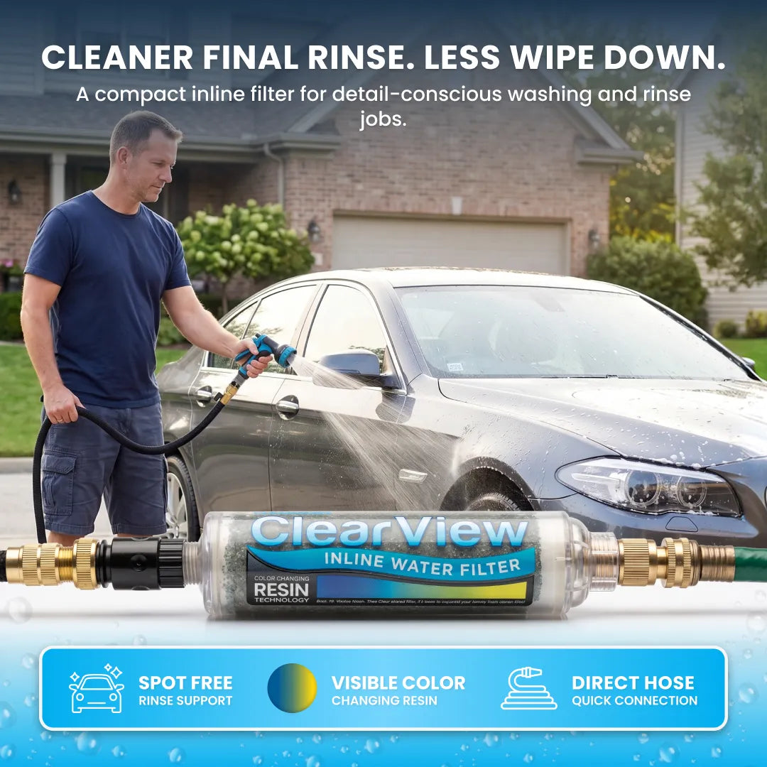 ClearView Inline Color Changing DI Resin Filter connected to a garden hose, with a man rinsing a car in the background.
