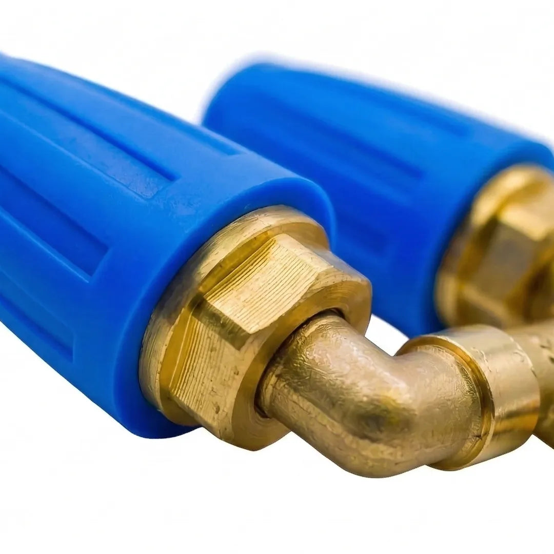 Close-up of the brass elbow fitting and blue nozzle casing on a dual turbo nozzle.