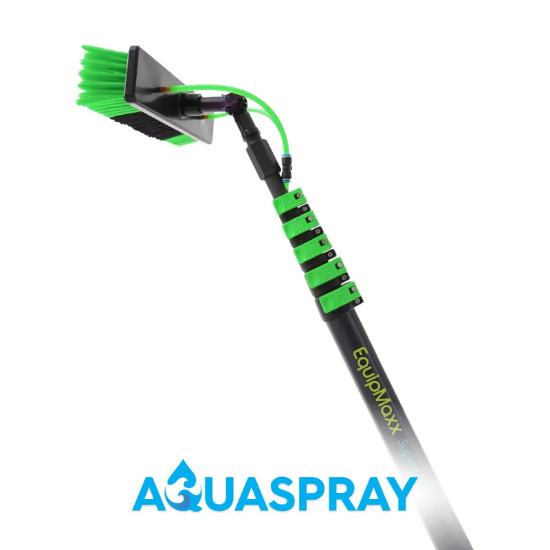 Diagonal side view of an aluminum water fed pole with green tubing, green clamps, and a green-bristle brush head.