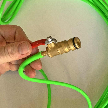 Handheld view of the Shut Off Valve connected to the Water Fed Pole hose.