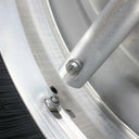 21" Stainless Steel Rotating Roof Cleaner for Pressure Washers, close-up of a spray nozzle on the rotating bar beside an adjustment bolt